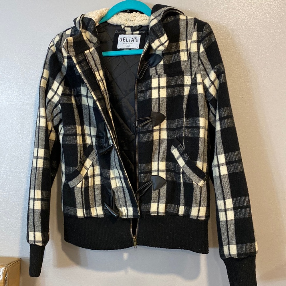 Delia’s plaid jacket